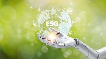 Artificial intelligence mechanical robot hand unity holding the earth with ESG text, world development of AI technology, modern machine learning research, environment, and ecology concept photo