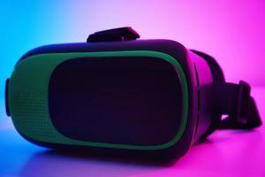 Virtual reality glasses on colorful background. Future technology, VR concept photo