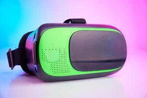 Virtual reality glasses on colorful background. Future technology, VR concept photo