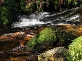 All Saints waterfall in Germany, spring time, sunny weather photo