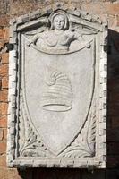 Medieveal bas relief Burano Venice photo