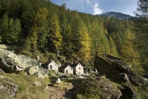 old stone cabin in mountain photo