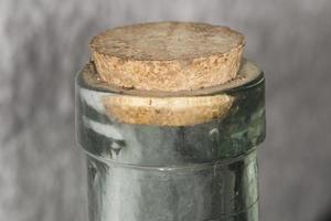 Cork top stopper cap on glass bottle photo