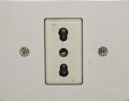 An old european electric wall socket photo