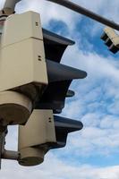 traffic light with view from below in the sky photo