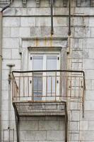 Old Building fire ladder and window detail photo