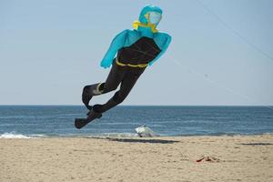 Scuba diver kite on the sky background photo