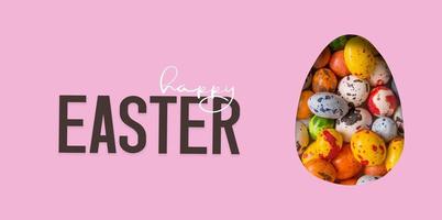 Happy Easter text and cut out Easter egg and colorful chocolate eggs. Happy Easter greeting banner photo