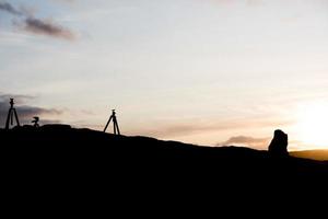 photographic tripod black silhouette at sunset photo