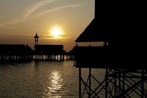 A  Stilt House at the sunset photo