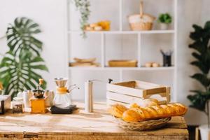 Professional barista preparing coffee using chemex pour over coffee maker and drip kettle. Alternative ways of brewing coffee. Coffee shop concept. photo