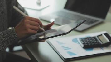 Financial Business team present. Business man hands hold documents with financial statistic stock photo, discussion, and analysis report data the charts and graphs. Finance Financial concept video