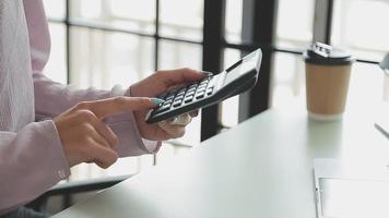 Financial Business team present. Business man hands hold documents with financial statistic stock photo, discussion, and analysis report data the charts and graphs. Finance Financial concept video
