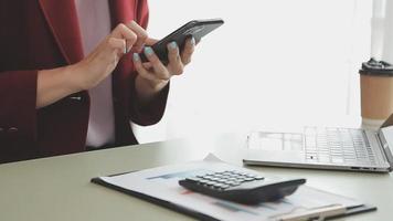 Financial Business team present. Business man hands hold documents with financial statistic stock photo, discussion, and analysis report data the charts and graphs. Finance Financial concept video
