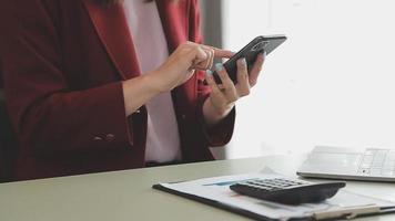 Financial Business team present. Business man hands hold documents with financial statistic stock photo, discussion, and analysis report data the charts and graphs. Finance Financial concept video