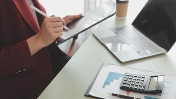 Financial Business team present. Business man hands hold documents with financial statistic stock photo, discussion, and analysis report data the charts and graphs. Finance Financial concept video