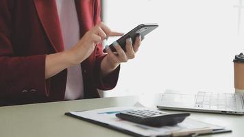 Financial Business team present. Business man hands hold documents with financial statistic stock photo, discussion, and analysis report data the charts and graphs. Finance Financial concept video