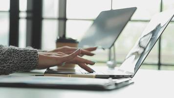 Financial Business team present. Business man hands hold documents with financial statistic stock photo, discussion, and analysis report data the charts and graphs. Finance Financial concept video