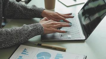 Financial Business team present. Business man hands hold documents with financial statistic stock photo, discussion, and analysis report data the charts and graphs. Finance Financial concept video