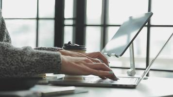 Financial Business team present. Business man hands hold documents with financial statistic stock photo, discussion, and analysis report data the charts and graphs. Finance Financial concept video