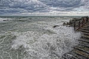 Sea Storm tempest on the rocks photo