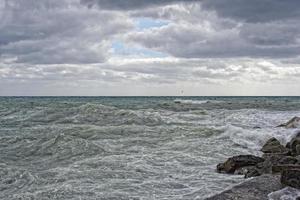 Sea Storm tempest on the rocks photo