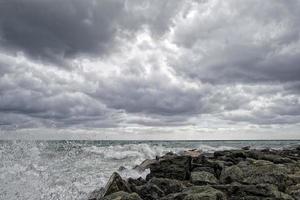 Sea Storm tempest on the rocks photo