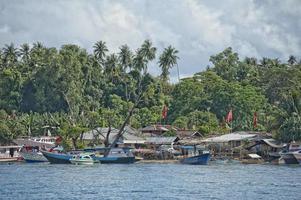 indonesian fishermen village photo