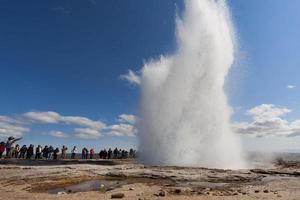 Geyser in Iceland while blowing water photo