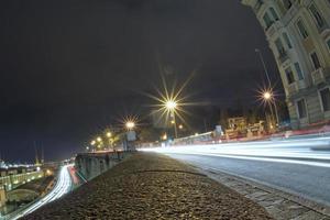 Car light tracks on Genoa Flyover at night photo