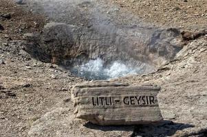 Little Geyser in Iceland while blowing water photo