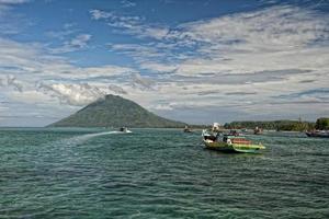 A boat on the reef in tropical paradise photo