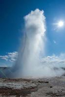 iceland geyser while erupting water photo