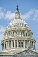 Dome of Washington DC Capitol on cloudy sky photo