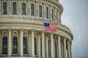 Washington DC Capitol detail on cloudy sky photo