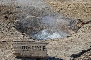 Little Geyser in Iceland while blowing water photo