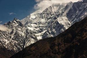 Snow capped shoulder of the Dhaulagiri mountain photo