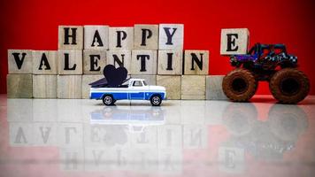 minahasa, Indonesia  January 2023, Happy valentine's day from stacked wooden blocks photo