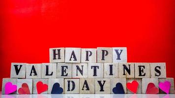 Happy valentine day on wooden blocks photo