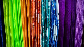 a variety of colorful curtains in the curtain shop photo