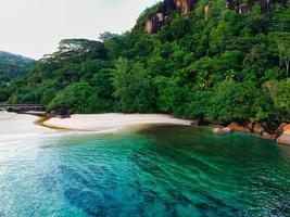 Drone shot of Louis beach, turquoise sea and beautiful scene, and small river photo