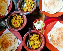 Traditional Bangladeshi Breakfast, Ruti and Sajbi vaji. photo