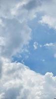 White Soft Fluffy Clouds on Blue Beautiful Sky. White Puffy Cloudscape. Cumulus Cloud Texture Background. Sky on Sunny Day. Pure White Clouds Beautiful Sky photo
