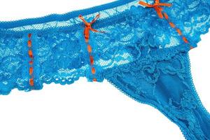 Blue lace thong with bow, ladies panties isolated over white photo