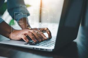 Concept of online document management technology. Businesspeople manage corporate databases through cloud, cyberspace technology and large, paperless archives of important, file and online storage. photo