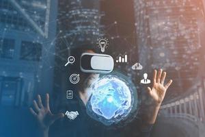 Businesswoman wearing VR glasses and accessing the Cloud Computing Technology Internet Storage Network Concept And a large database big data Through internet technology. Metaverse technology idea. photo