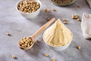 Traditional fermented soy miso seasoning in a bowl on the table. Japanese food. photo