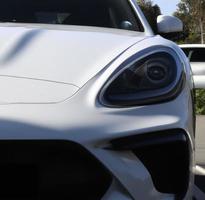 white luxury car closeup photo