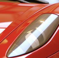 red sports car closeup photo
