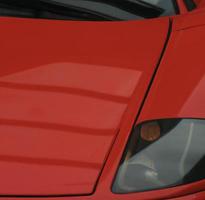 red sports car closeup photo